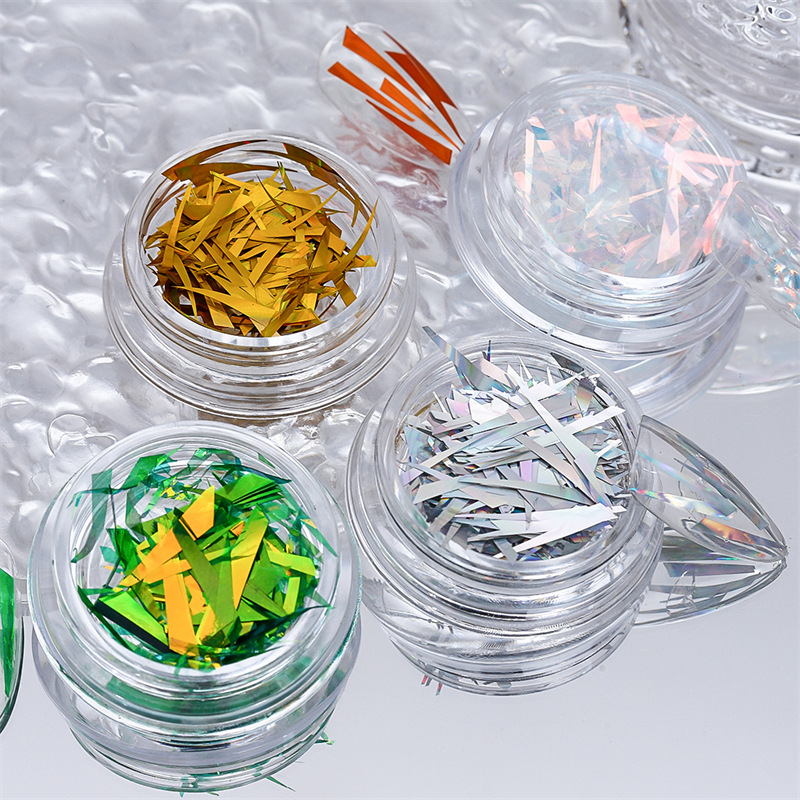 Arte de uñas Aurora duende fragmentos celofán irregular láser japonés Internet celebridad pegatinas Corte libre de uñas al por mayor