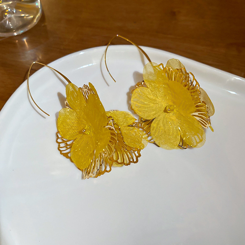 Pendientes de flores de moda coreana de nuevo estilo femenino fresco niña vacaciones viento gancho de oreja temperamento femenino pendientes de nicho de alto nivel