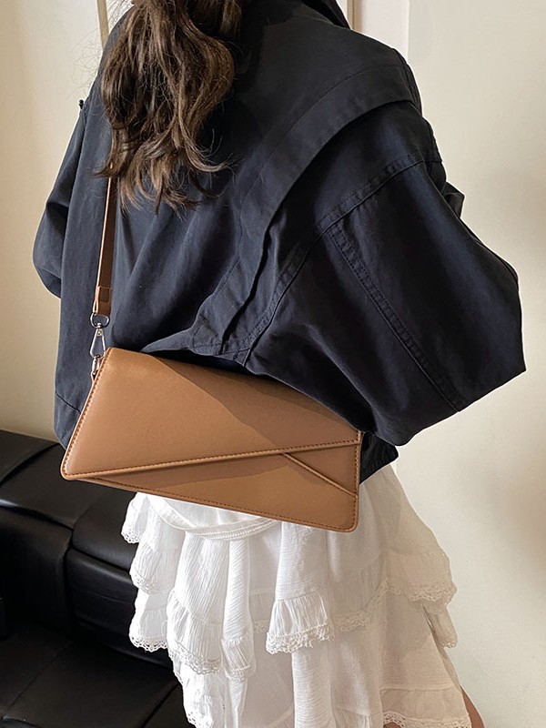 Bolso de diseño de nicho para mujeres 2025, verano nuevo estilo coreano bolso cuadrado simple temperamento casual bolso de hombro de mujer