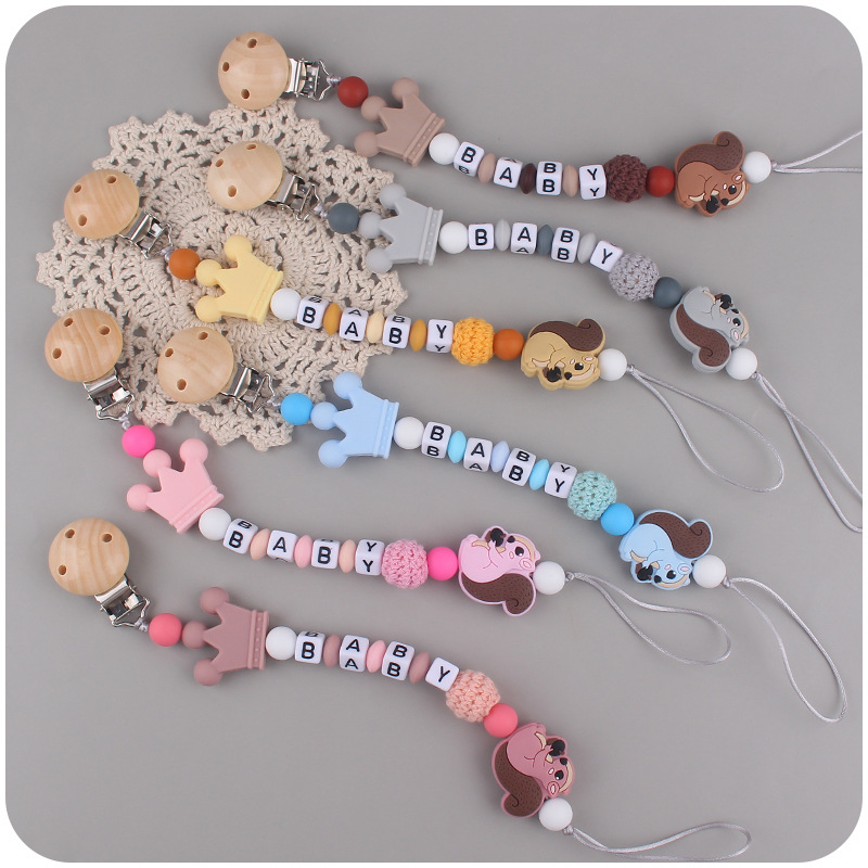 Nuevo bebé de dibujos animados animal ardilla pequeña mordedor creativo bebé DIY mordedura molar Cadena de pezón cadena anti-caída