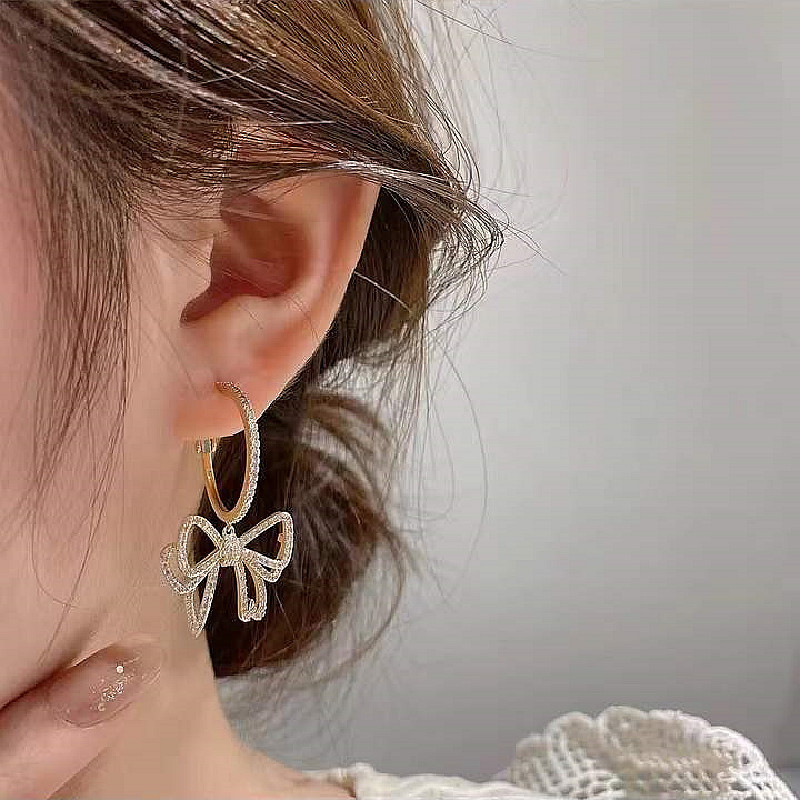 Fashion big bow tassel new alloy earrings female