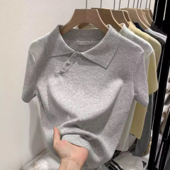 チャイナドレス式の斜めボタンPolo襟の短い薄い半袖のニットの女性の夏の新型の爆発的なデザインのシックな上着