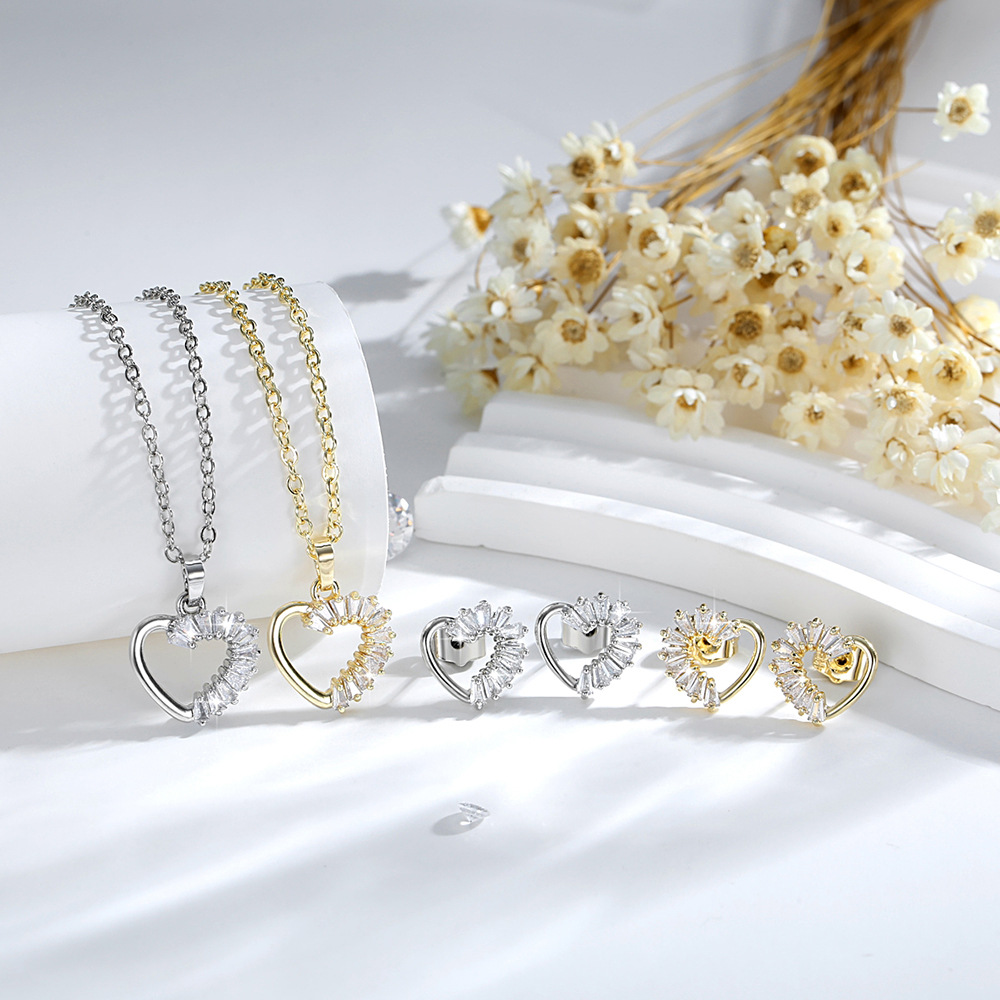 Ventas transfronterizas en caliente de Europa y los Estados Unidos colgante de corazón set de cobre 14K oro zircón collar joyería pendientes
