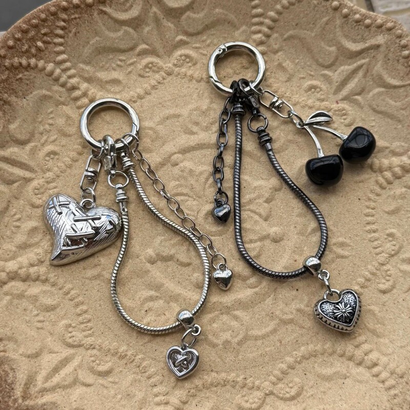 Korean ins-style niche cherry heart snake bone pendant phone chain stainless steel CCD camera pendant gift for girls