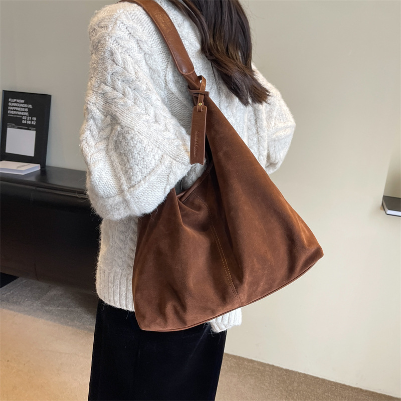 Bolsa de gran capacidad suave esmerilada para mujeres 2024 otoño y invierno nuevo retro viaje bolsa de hombro bolsa de moda extranjera