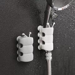 Shower bracket without punching shower accessories fixed seat suction cup caterpillar shower head base manufacturer wholesale