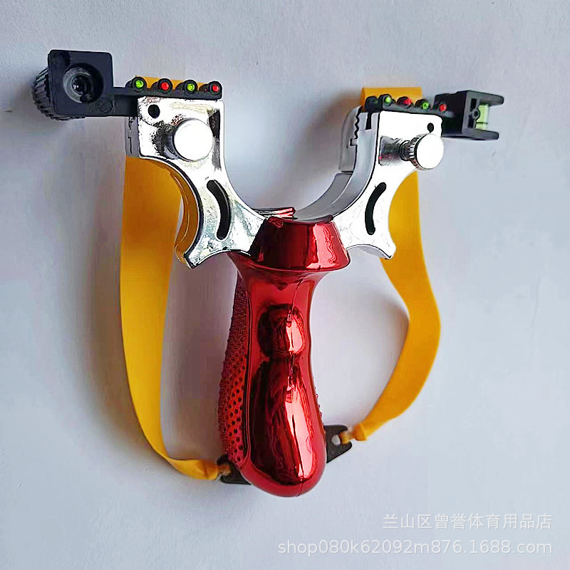 빨간 새총은 고무 밴드에 적외선 시야 세트를 보냅니다.