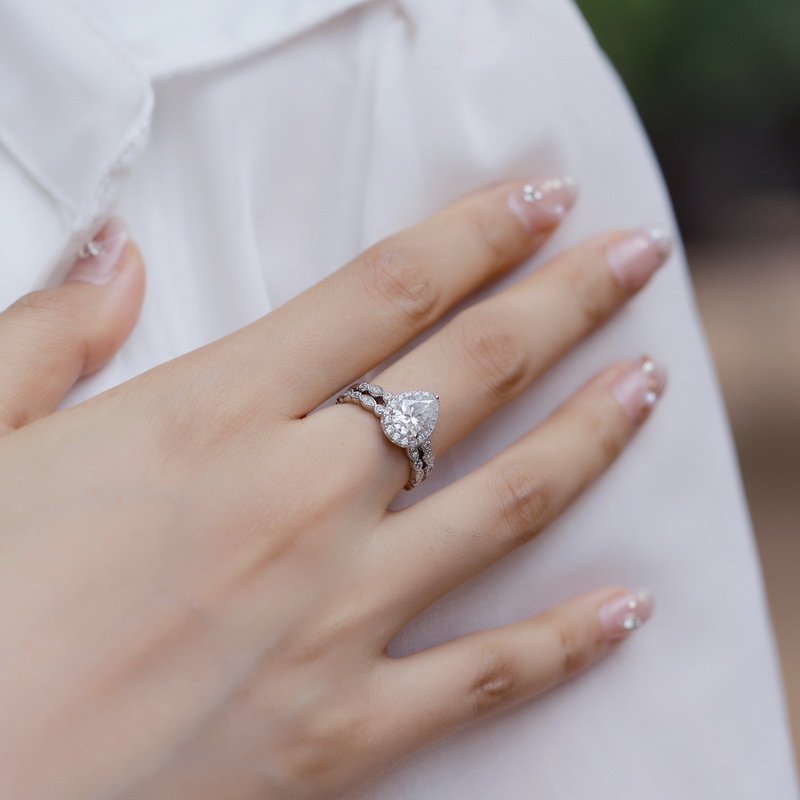 Nuevo anillo de moissanita de gota de agua de lujo ligero transfronterizo S925 anillo de combinación de todo fósforo de moda brillante de plata pareja para novia