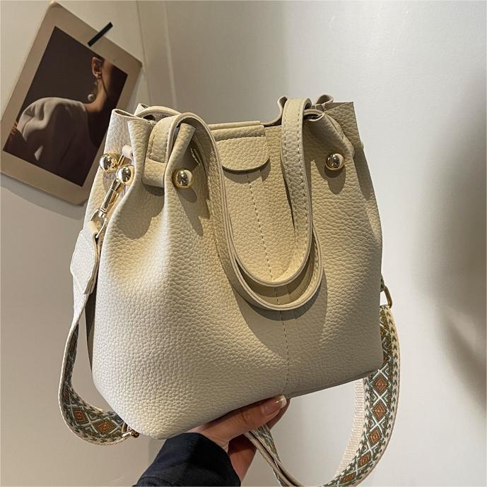 Estilo coreano de alta calidad de todo-bolso a juego para las mujeres 2024 Nueva correa de hombro de ancho Todo-juego bolsa de mensajero texturizado mano llevar bolsa de cubo