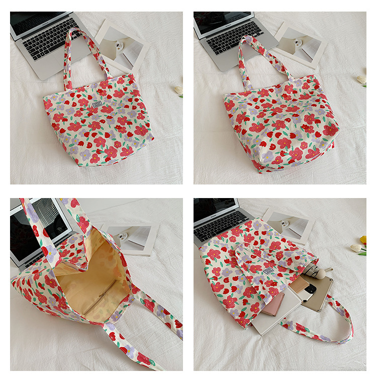 The large-capacity single-shoulder bag for student commuting is a bestseller in early spring. The Korean-style fresh and simple floral fabric bag is a versatile tote bag undefined
