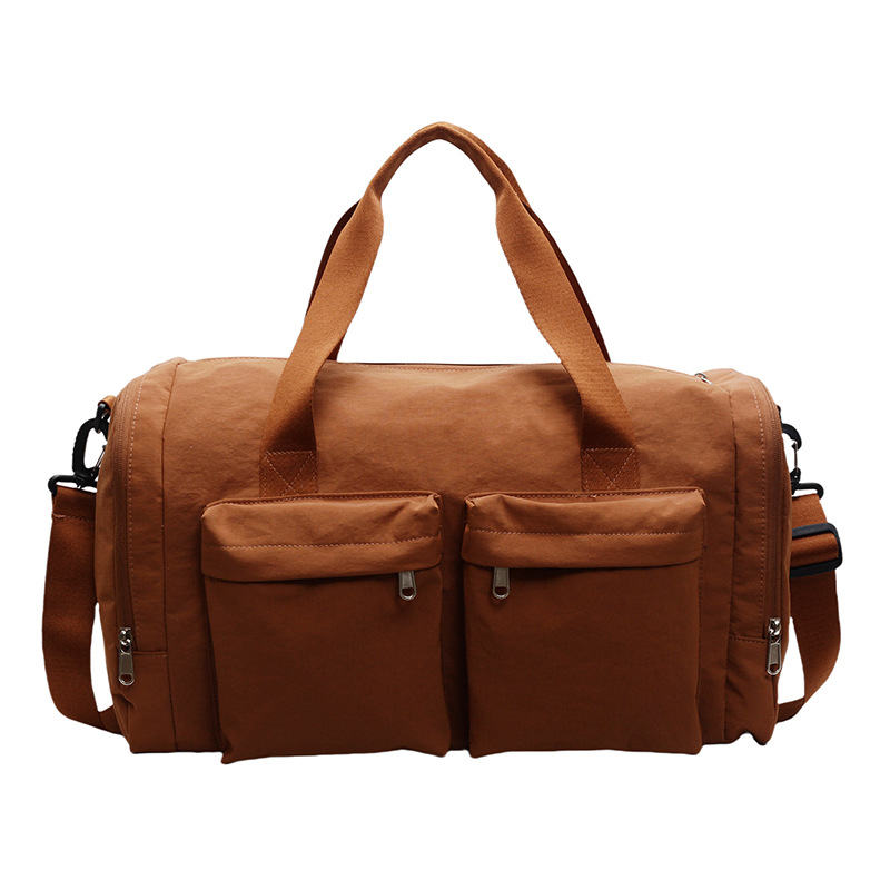 Bolsa de viaje de gran capacidad de textura retro bolso de almohada de moda 2025 nuevo bolso de hombro universal bolso de viaje