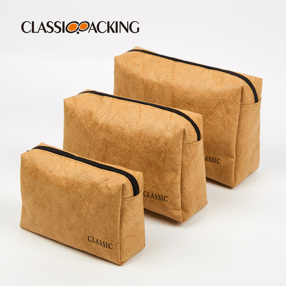 Bolsa de almacenamiento de papel DuPont de tres piezas al por mayor de fábrica Bolsa de cosméticos impermeable resistente al desgaste multifuncional simple con logotipo impreso