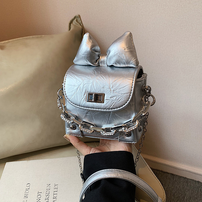 Bolso de mochila este año popular mini bolso de mujer nuevo arco de color sólido cadena bolso de mano bolso de hombro