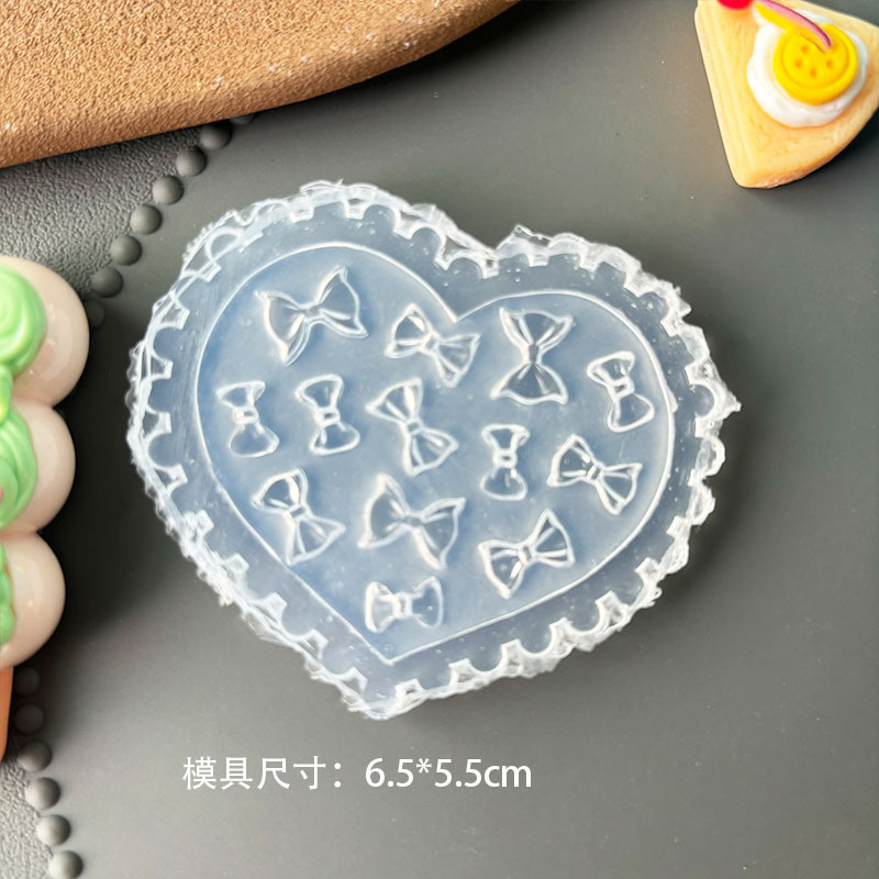 Venta caliente transfronteriza molde de manicura de alta transparencia animal de dibujos animados oso bowknot ramo DIY modelo de manicura en relieve tridimensional