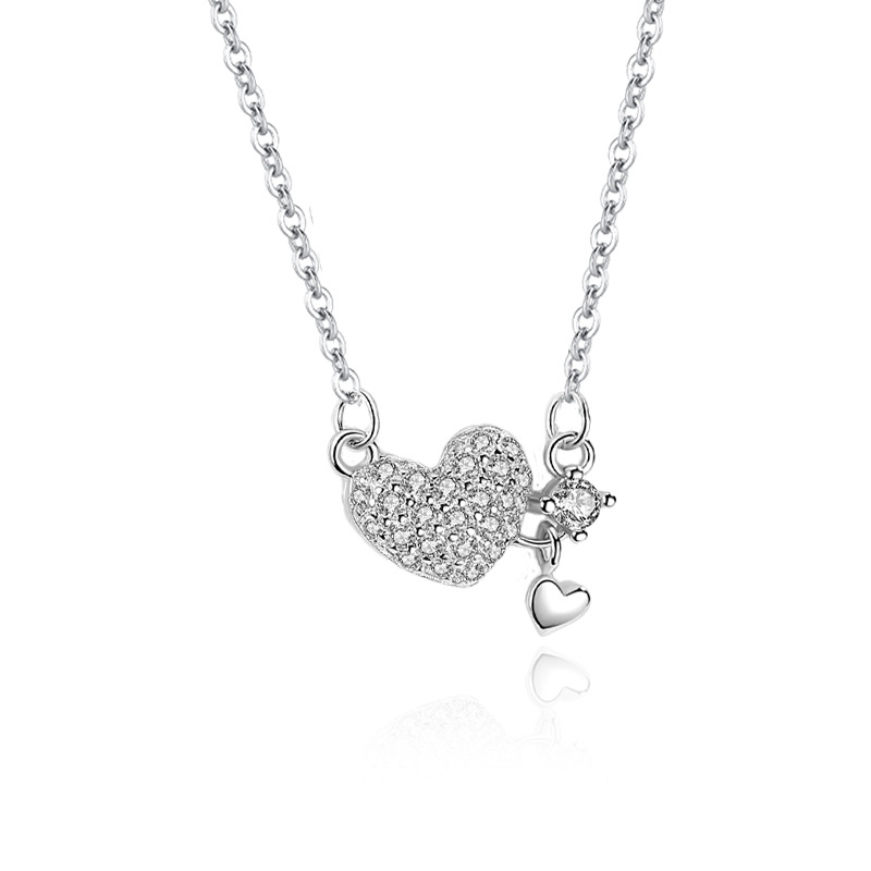 En línea de la celebridad de Singapur S925 plata esterlina en forma de corazón collar de diamantes colgante nicho simple diseño amor melocotón clavícula cadena femenina