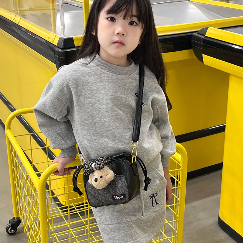 Mochila de cuerda extranjera de dibujos animados lindos perros de peluche, bolsas de hombro para niños, otoño y invierno, nuevas bolsas para niños