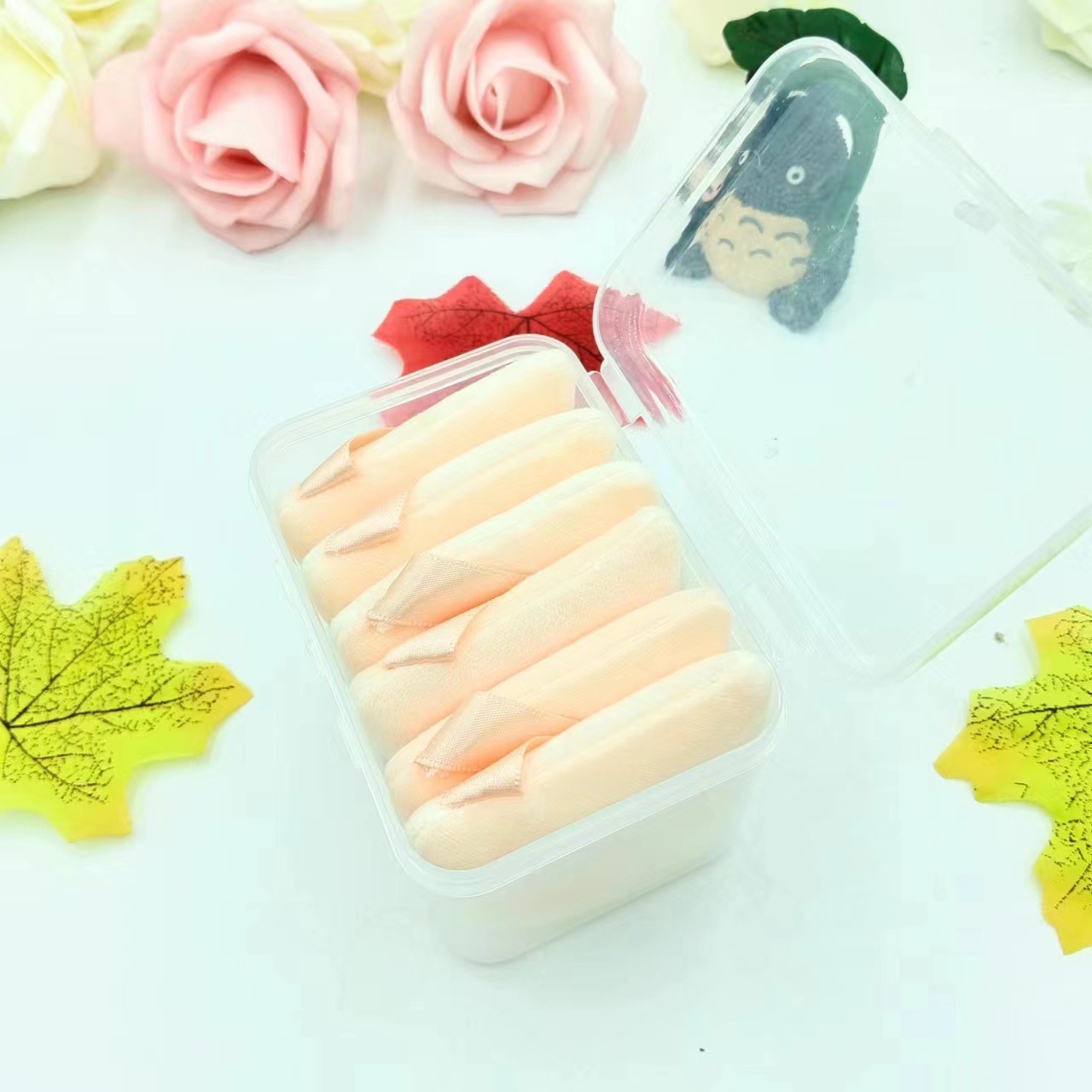 Nuevo triángulo negro soplo de polvo seco en forma de abanico de soplo de maquillaje soplo de polvo de miel mojado y seco herramientas de maquillaje de doble uso transfronterizo exclusivo