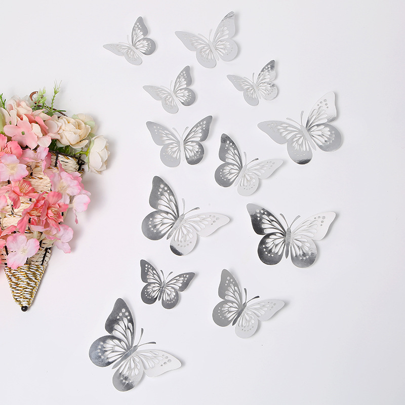 Doce mariposas plateadas en l