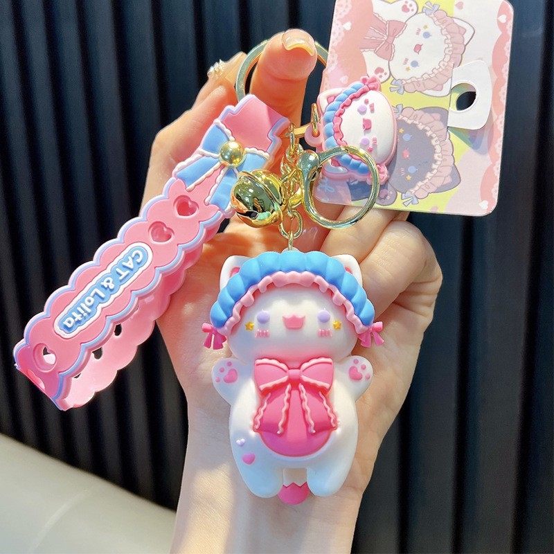 Keychain dinosaurio auténtico lindo bolso colgante de goma blanda llavero de automóvil muñeca pequeña máquina de regalos al por mayor image 15