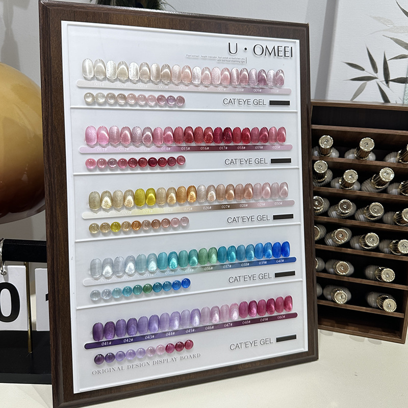 Nuevos productos de la Expo, la serie de escamas de brocado, pegamento de ojos para gatos, 50 colores, un conjunto completo de cuentas de vidrio, pegamento de esmalte de uñas, color de moda.