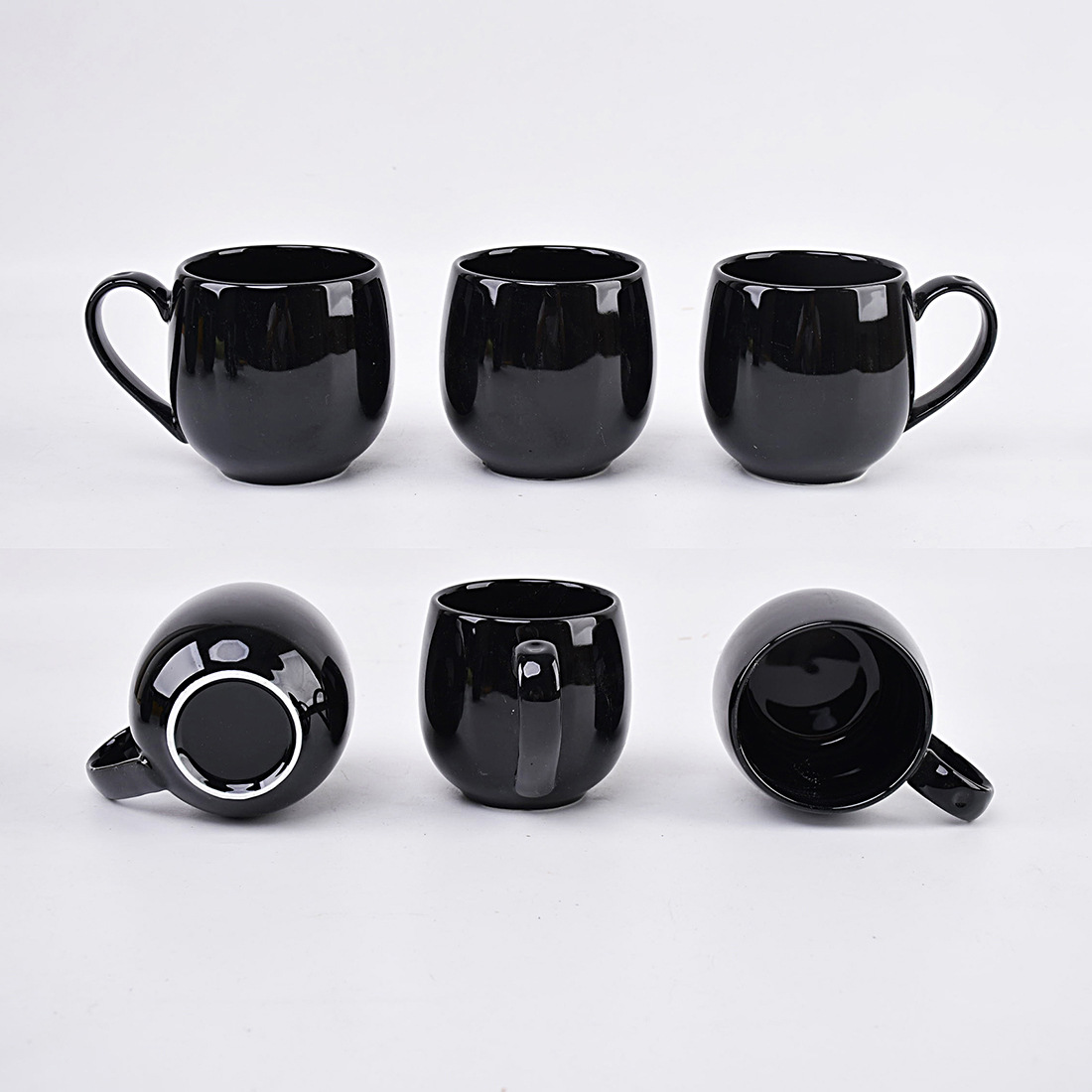 black A set of four six ceramic mugs for hot beverages
