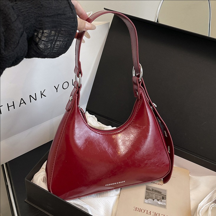 Cross-border coreano de alta calidad bolso de brazo portátil para mujeres 2025 nueva moda de invierno simple bolso de hombro de moda