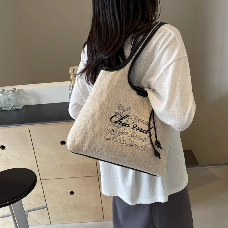 ?小众设计洋气帆布腋下包女2025新款百搭大容量通勤单肩包