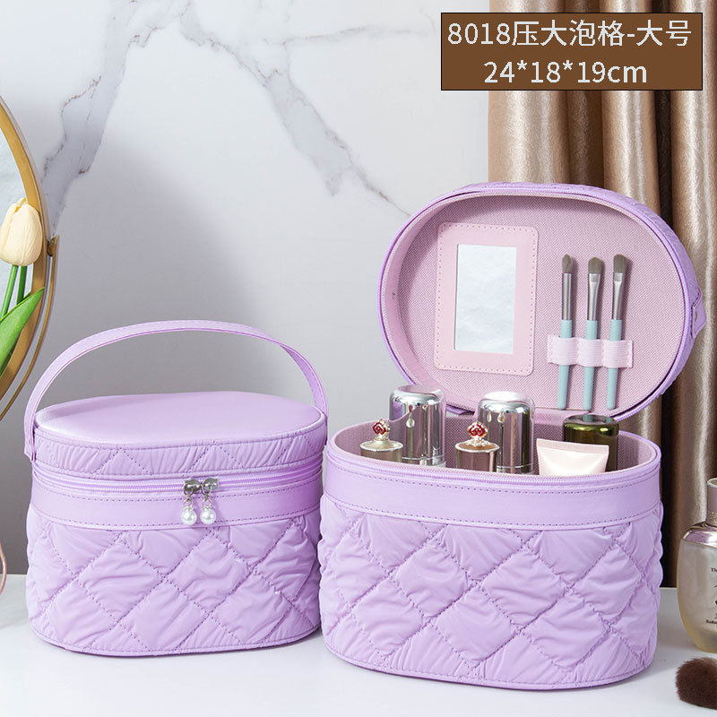 2025 nuevo estuche de cosméticos de gran capacidad, maleta de burbujas de cuero de pu, caja de almacenamiento de herramientas de belleza portátil de alto valor