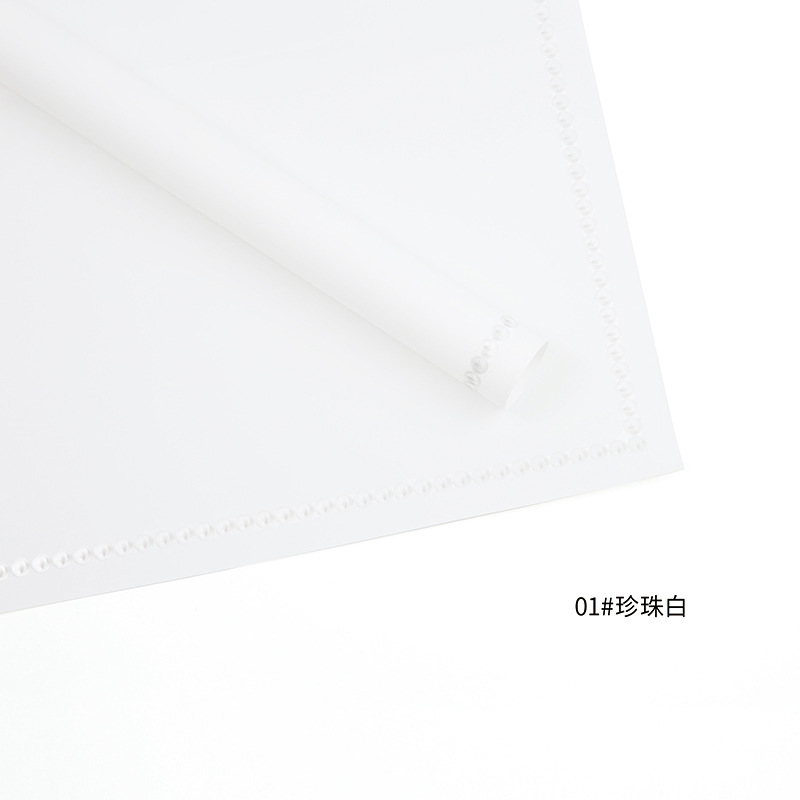 Huaxi fábrica de perlas de palma al por mayor de papel elegante puntos alrededor del borde impermeable perla envoltura material de embalaje de flores de papel