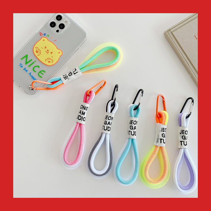 Phone case lanyard, colorful black and white pendant decoration for bags and school bags, unisex handmade accessory woven strap with fluorescent cord.