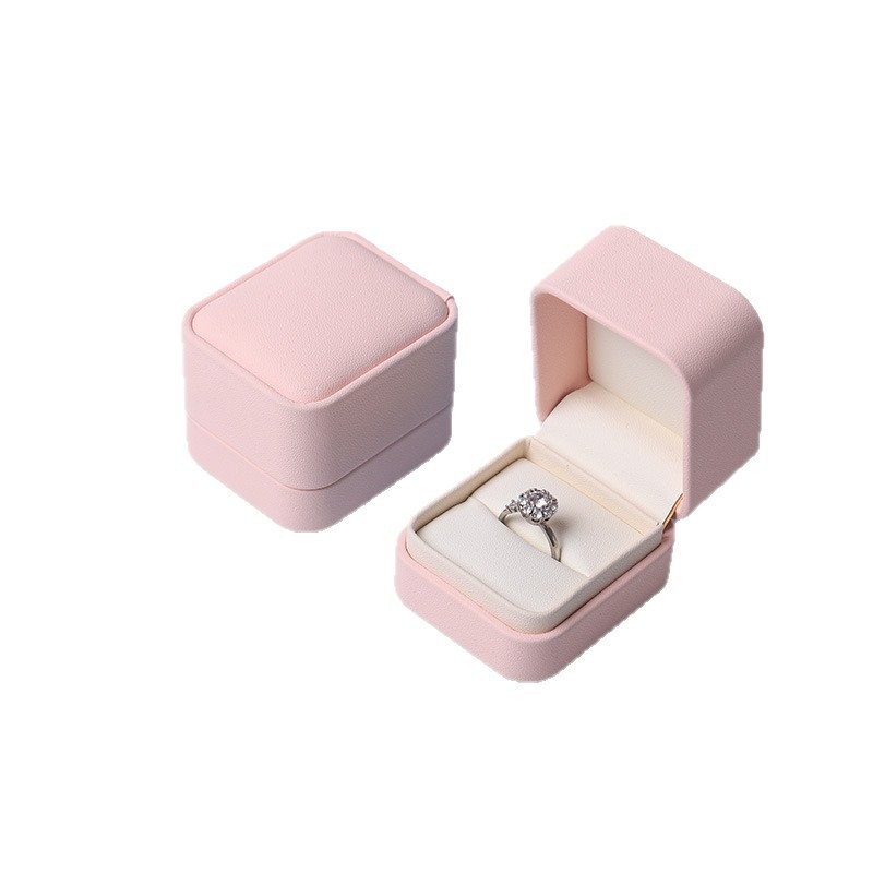Caja de joyería rosa de alta calidad de cuero pu caja de embalaje de marca de joyería logotipo colgante pulsera collar caja de anillo