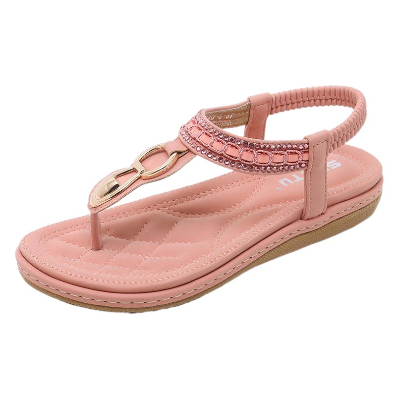 Verano 2024 sandalias de mujer europeas y americanas transfronterizas playa metal rhinestone zapatos planos más tamaño zapatos de mujer al por mayor