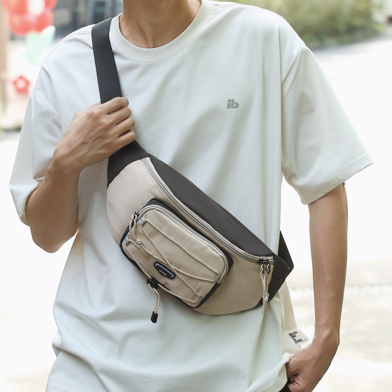 Bolso de pecho casual de moda para hombres 2024 verano nuevo bolso de mano móvil ligero bolso de mano para mujeres mochila de trabajo universal