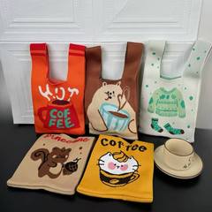 新商品の漫画のニットのカバンの高級感の大容量の女子学生のファッションの腕のカバンの個性の百合のハンドバッグのお土産