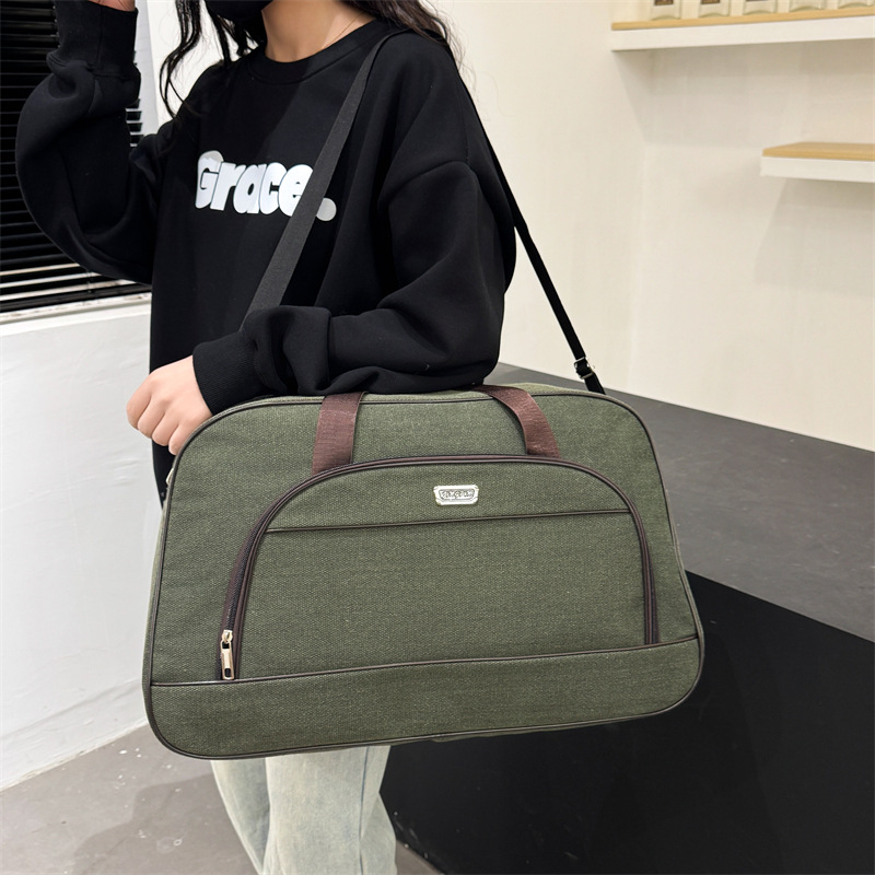 Nueva salida bolsa de lona gruesa bolsa de lona de alta calidad y gran capacidad para mujer equipaje de mano de viaje ligero de gran tamaño