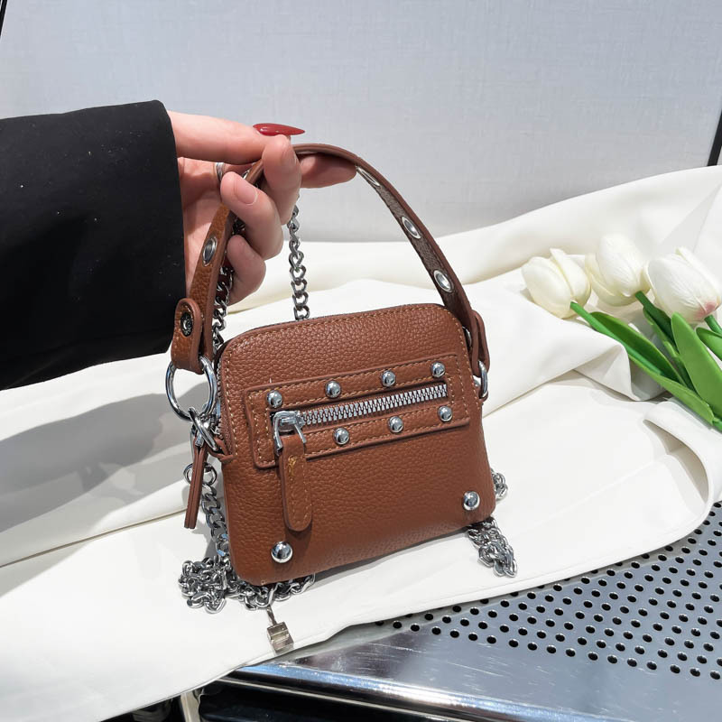 Bolso de cadena de textura transfronteriza 2025 nuevo bolso de mano con remache personalizado bolso de hombro mini patrón de lichi bolso de mensajero mujer