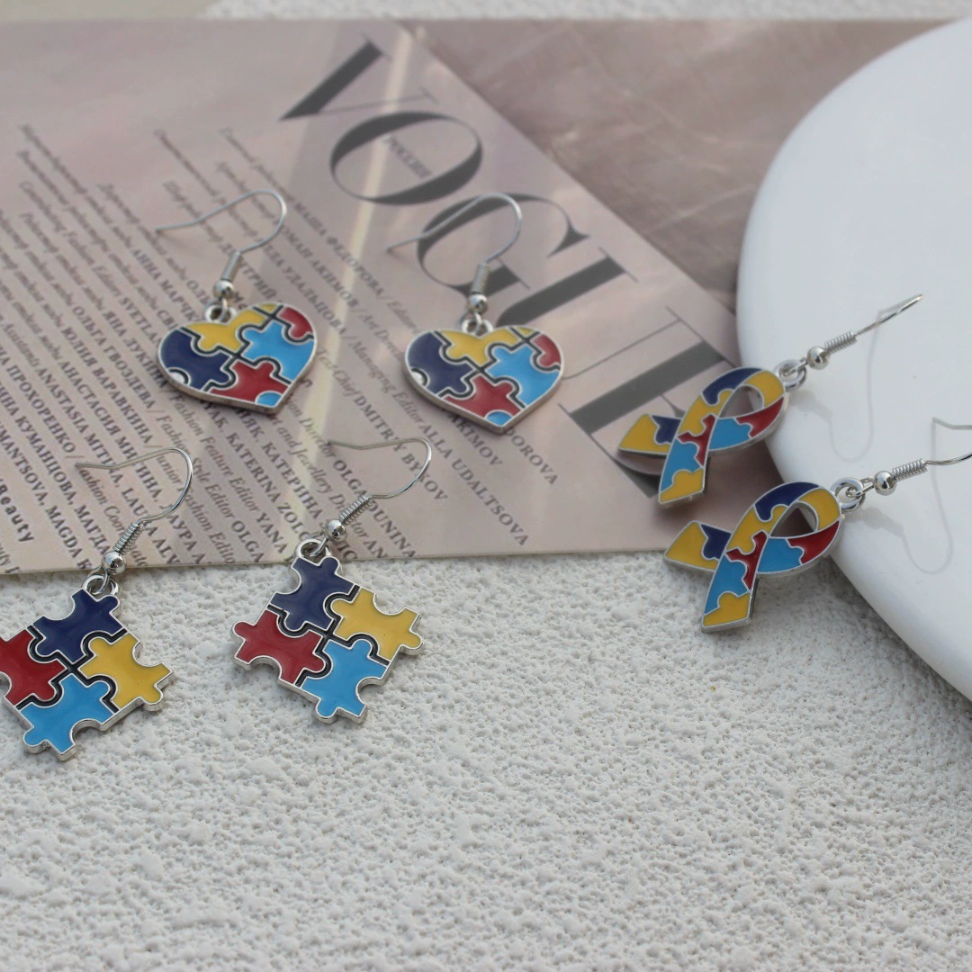 Трансграничная внешняя торговля ювелирные изделия металлические цветные головоломки масло преувеличение личности геометрический аутизм серьги производителей оптом