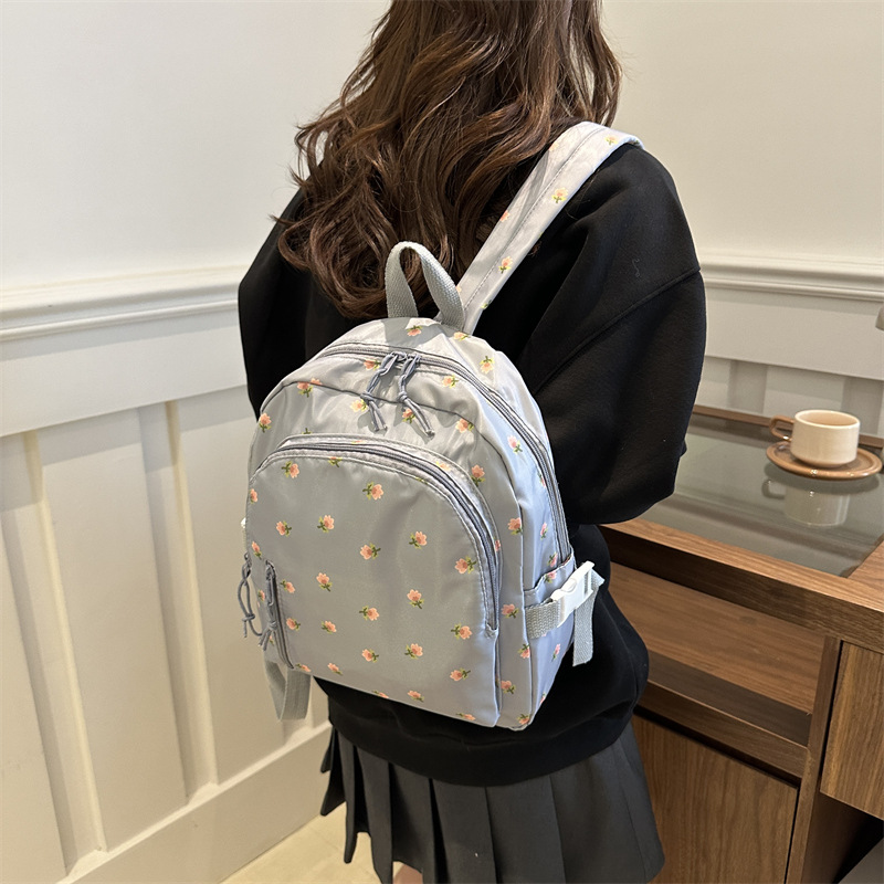 2025 primavera nueva moda coreana simple mochila de hombro casuales flores frescas lindas dulces mochila de estudiantes