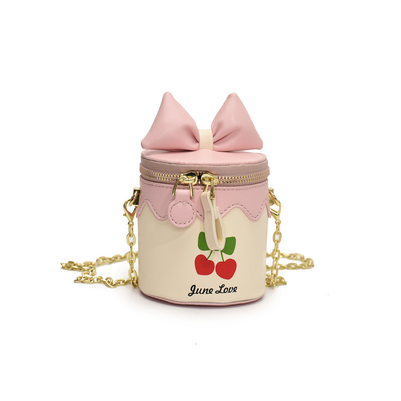 Bolso de cubo lindo japonés 2025 primavera y verano nuevo bolso femenino lindo lazo bolso de hombro mini cadena bolso de mensajero