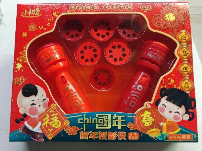 Dragón año Venta caliente proyección linterna juguete productos de año nuevo juguete luminoso festival juguete para niños fuente de regalo al por mayor