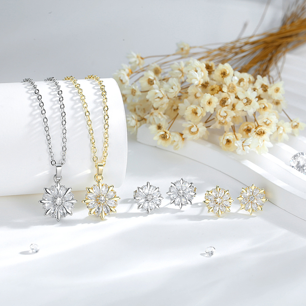 Ventas transfronterizas de flores colgante conjunto de joyería de moda damas collares de zircon orejetas de cobre chapado en oro joyería en forma de O