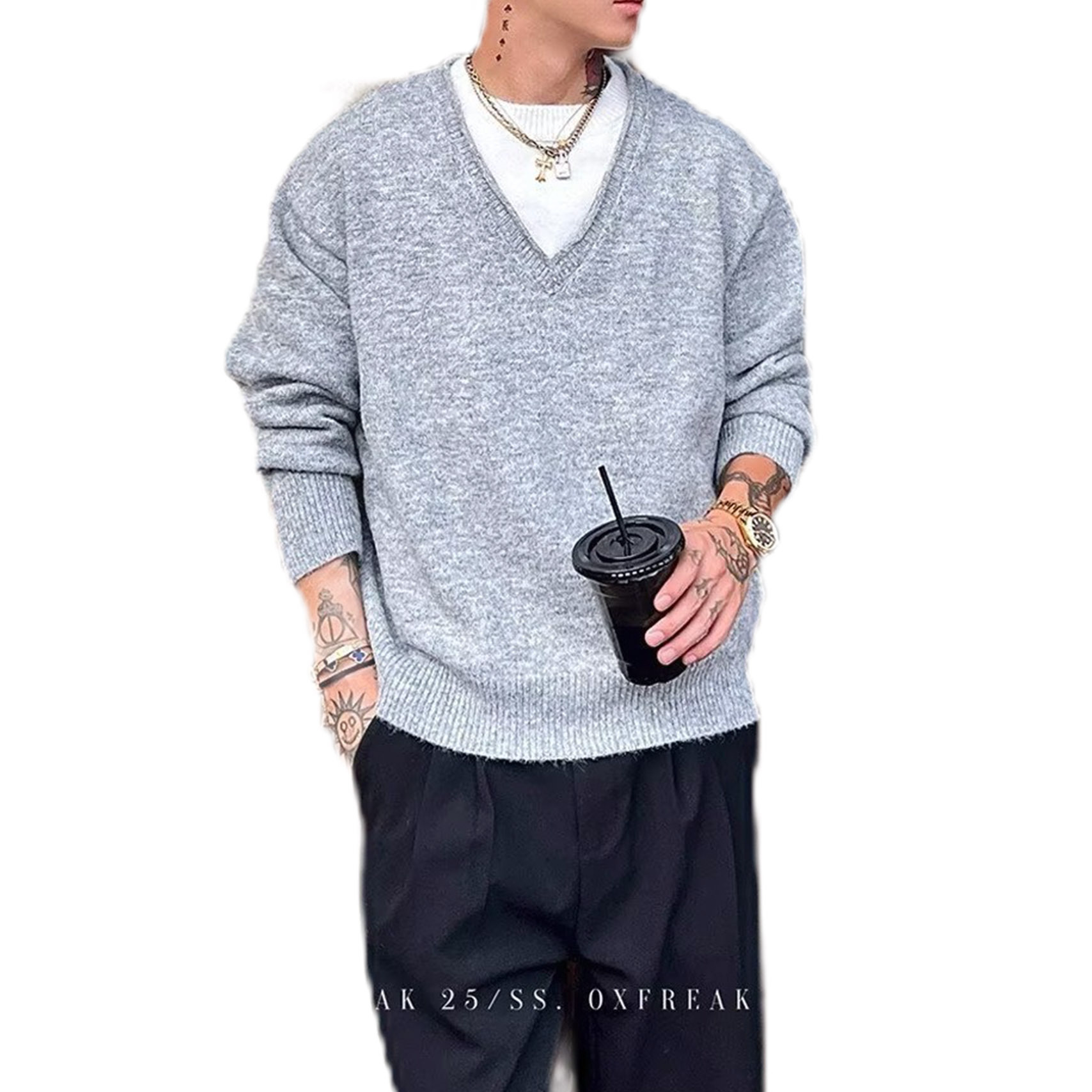 Explosiones transfronterizas de tamaño grande europeo falso dos piezas de cuello en V coreano jersey suéter masculino empalmado otoño y invierno fábrica de marea al por mayor