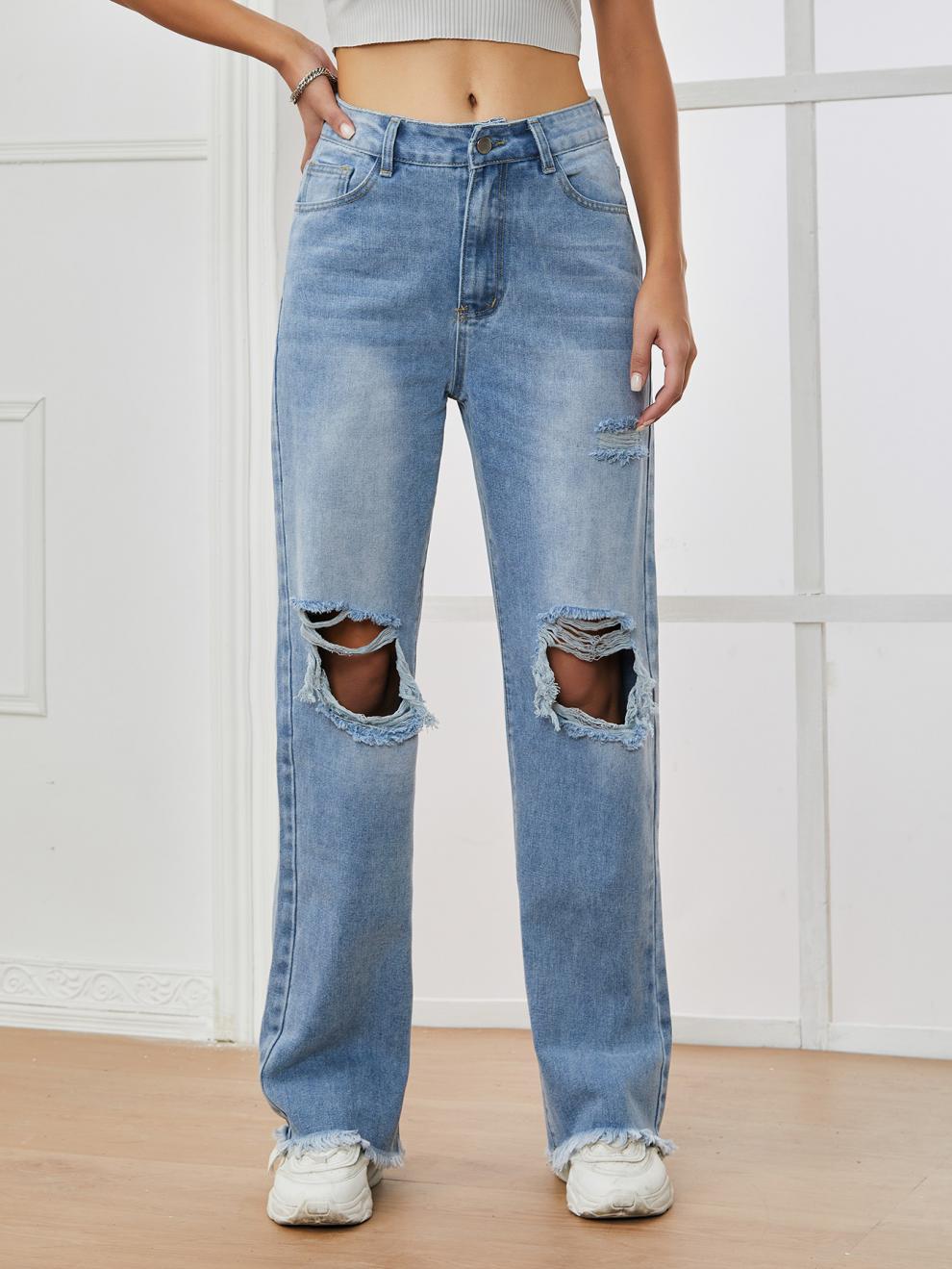 Detail of Distressed High Waist Jeans