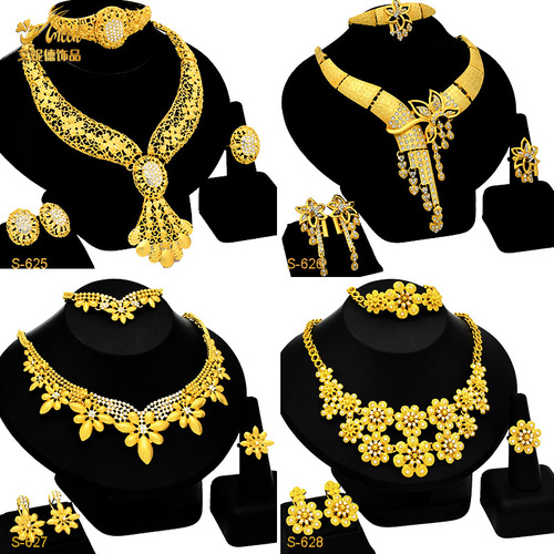 Gold-plated jewelry set for Nigerian bride, featuring an exaggerated flower-themed long necklace, ring, bracelet, and earrings set of four