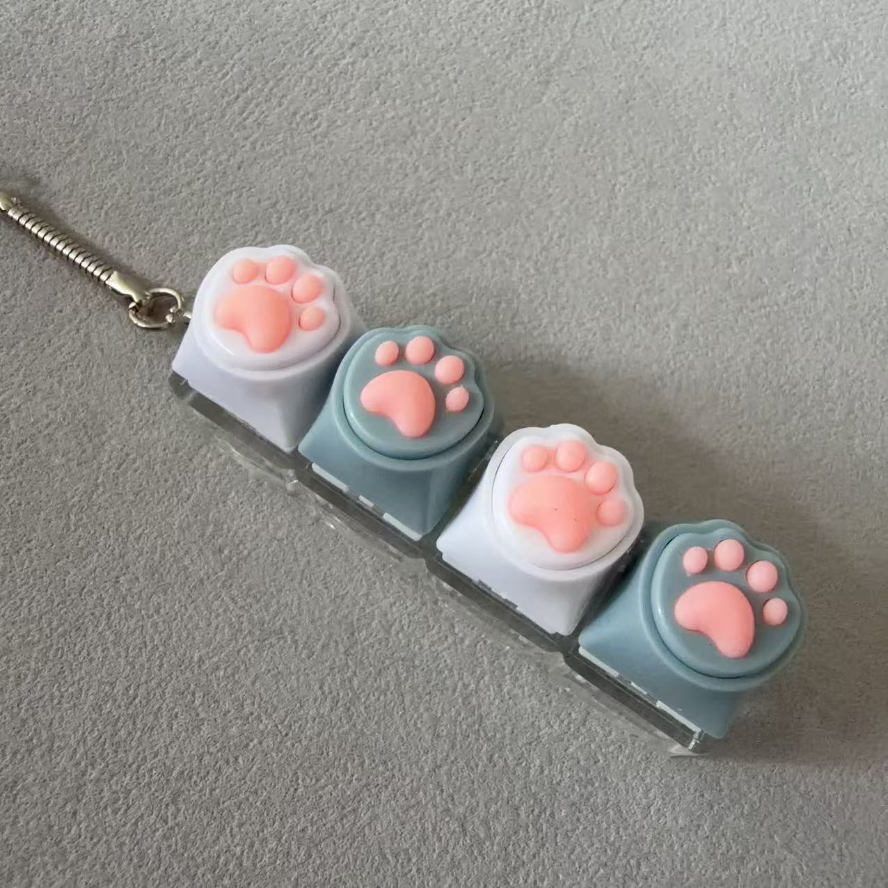 Four-button transparent shell-silicone cat claw (white gray white gray)