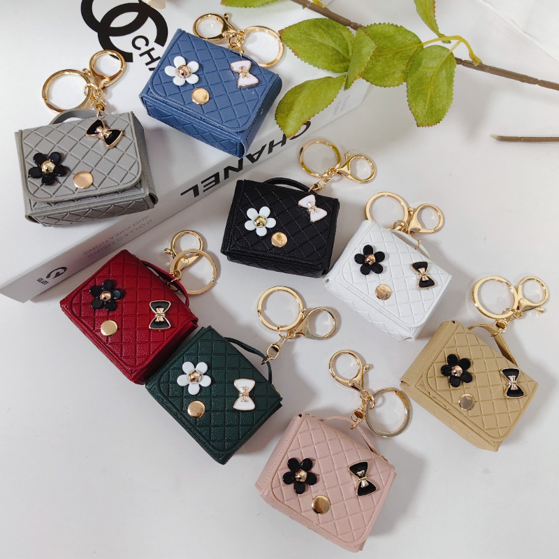 Nuevo estilo transfronterizo, moderno y exclusivo mini bolso acolchado tipo colgante, monedero para llaves, accesorio para auriculares.