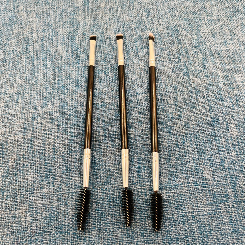 Directo de fábrica sola línea de cabeza oblicua negro cepillo de pestañas rizador de ojos cepillo de cejas cepillo de espiral injerto cepillo de cejas herramientas de belleza