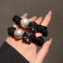 高級感のある新型のドリル真珠の大腸のシュシュの気質の馬尾の髪のひものシンプルな洋風のひもの皮の筋のアクセサリー