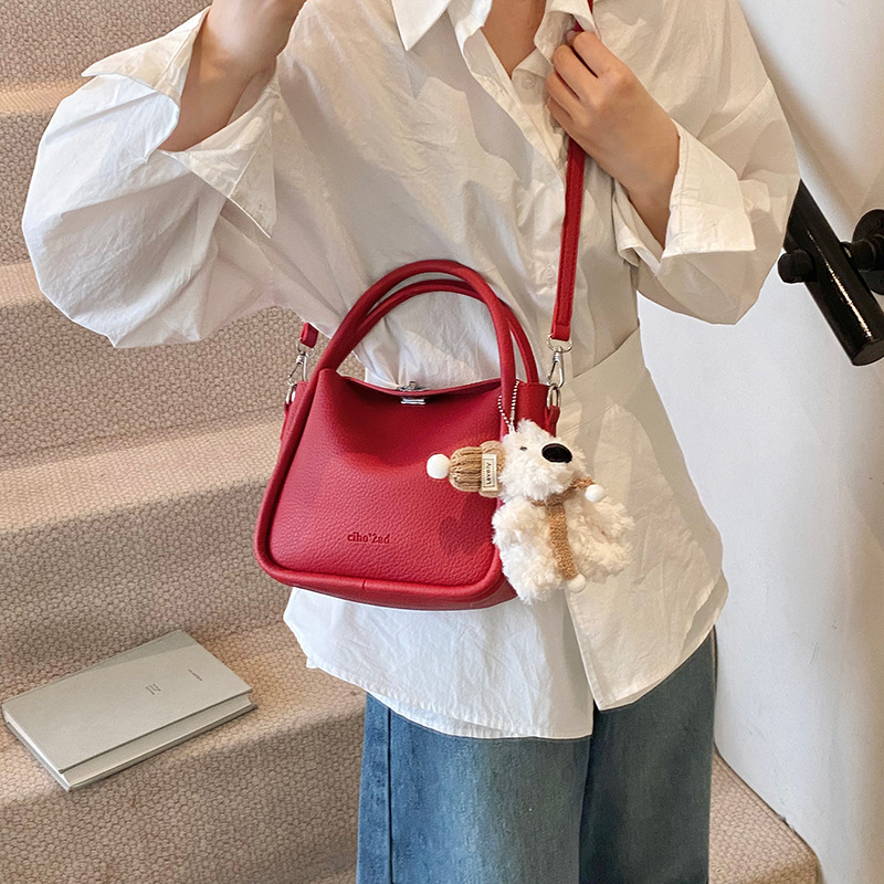 Bolso de cesta de verduras de estilo caliente de comercio exterior para mujer 2025 nuevo bolso de hombro casual simple bolso de cubo de aire occidental salvaje