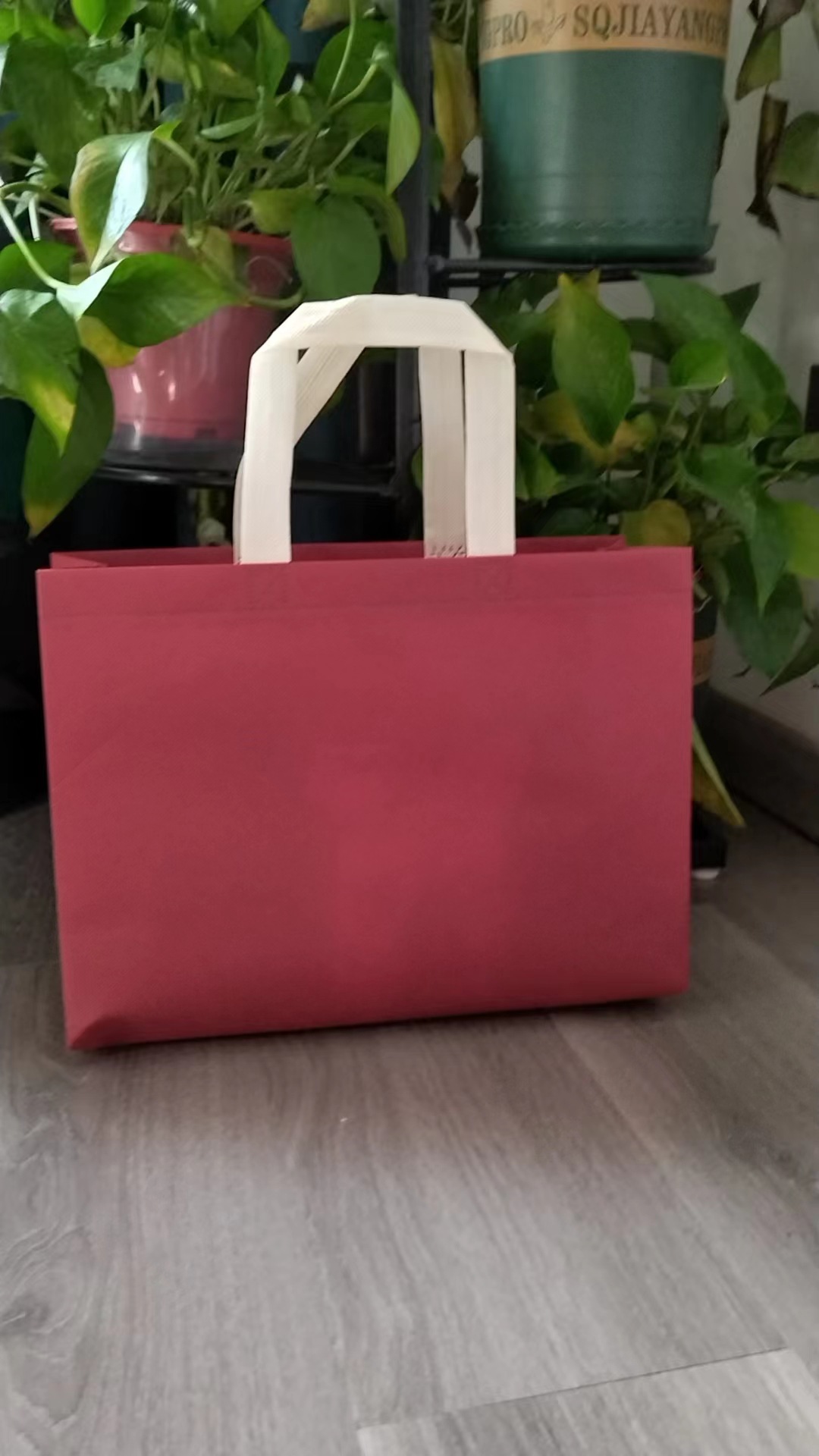 Burgundy, beige, handheld